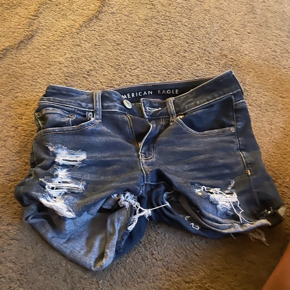 American eagle dark blue jeans next level stretch.